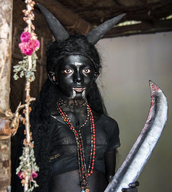 A devotee at Mutharamman Temple in Kulasekharapattinam