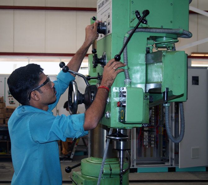 A student engaged in learning at a skill training centre