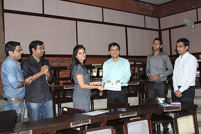 Anurag Singhal, fourth from left, receives a prize for 'Czars of online bazaar'