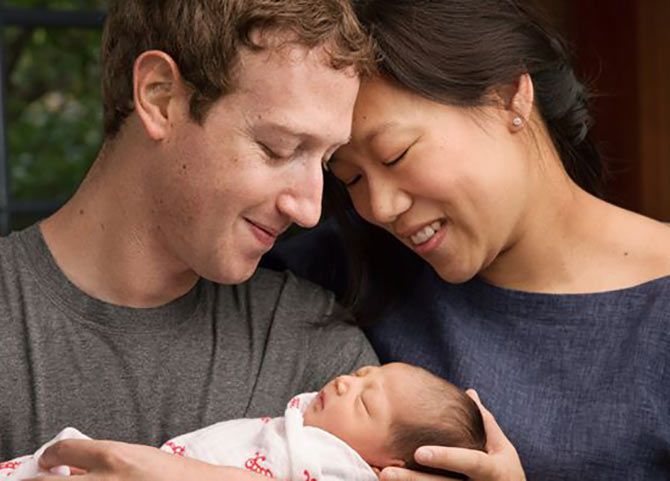 Mark Zuckerberg and Priscilla Chan with their daughter Chan
