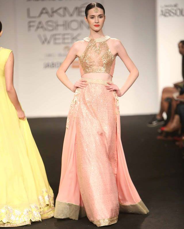 A model presents a Divya Reddy collection