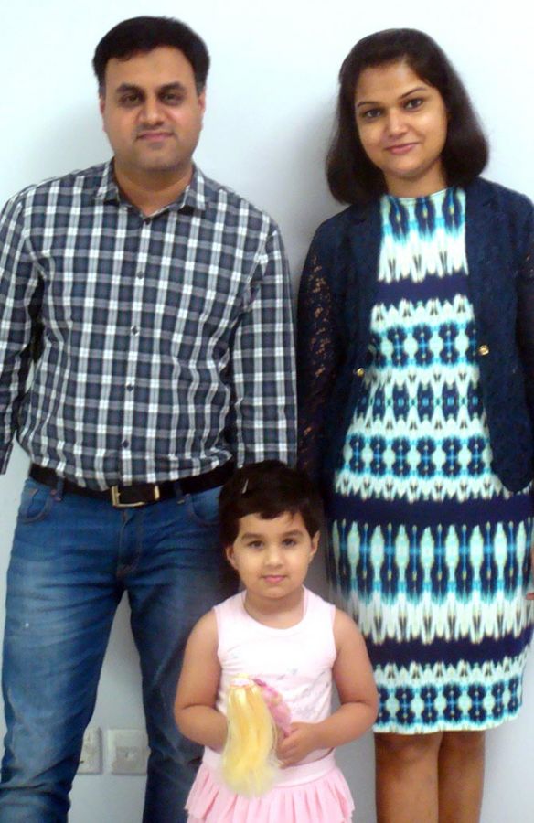 Vivek and Swati with their daughter