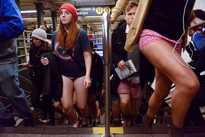 People with no pants take the subway during the annual No Pants Subway Ride in New York, January 10, 2016. 