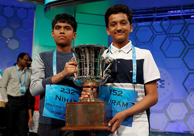 Jairam Hathwar, 13, of Painted Post, N.Y. (L), and Nihar Janga, 11, of Austin, Texas (R), celebrate as co-champions during the 2016 Scripps National Spelling Bee at the Gaylord National Resort and Convention Center.
