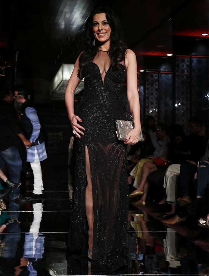 Matching Shibani's oomph was actor Pooja Bedi, who too was dressed in a sheer black dress