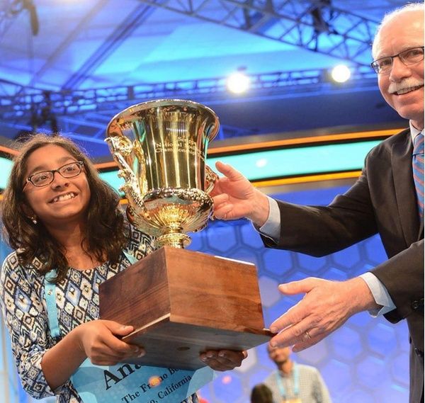 Ananya Vinay took home the 2017 Scripps National Spelling Bee Champion title and trophy. Photograph: Scripps National Spelling Bee/Instagram