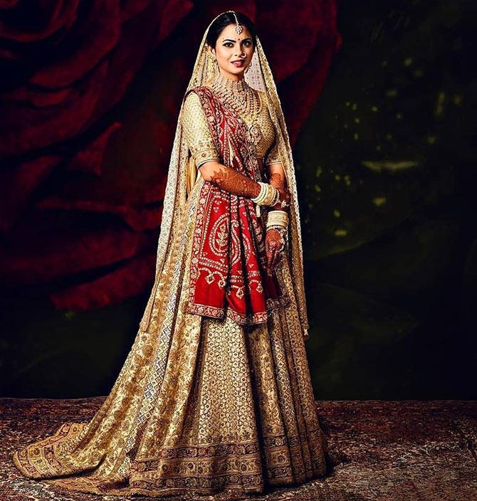 Image result for Off white-golden lehenga isha ambani