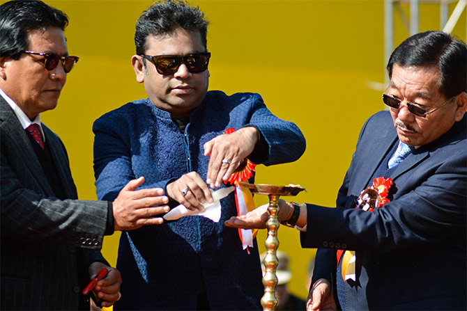 Sikkim Chief Minister Pawan Chamling, right, with composer A R Rahman, centre, at the Red Panda Winter Carnival. Photograph: Kind courtesy Sikkim Tourism