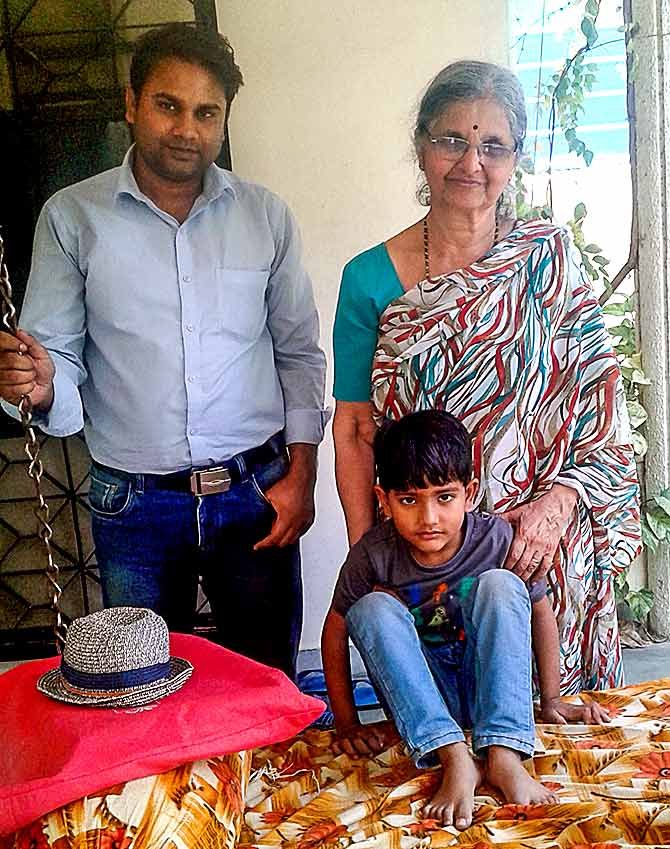Ravikant Rajput with Neela Joshi and his son