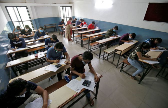 Students take an entrance exam in Gujarat, India
