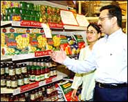  RPG Enterprises Vice-Chairman Sanjeev Goenka with Bollywood star Kareena Kapoor, who inaugurated the Hypermarket in Mumbai
