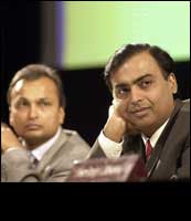 Anil (left) and Mukesh Ambani. STR / AFP / Getty Images