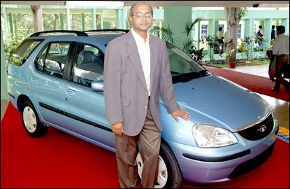 V Sumantran, Tata Motors executive director, stands by the new Tata Indigo Marina, at a press-preview in Pune on Tuesday. The Tata Indigo Marina, slated for launch 15 September in Mumbai, is the fifth model from India's leading automotive manufacturer and comes on the heels of a successful launch of the Tata Indigo sedan in December 2002. The Tata Indigo has remained the best selling sedan in the country since launch, clocking sales of 50,000 units within 20 months, the fastest for any sedan. Photo: Rob Elliott / AFP / Getty Images