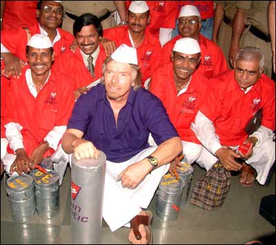 Virgin Atlantic Airways Chairman Richard Branson with Mumbai's dabbawallahs on Friday. Photo: Arun Patil