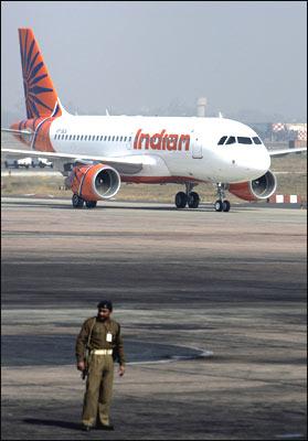 Indian Airlines' -- now renamed Indian -- new Airbus A-319 aircraft arrives at the Indira Gandhi International Airport in New Delhi on Wednesday. IA plans to buy 43 aircraft, including A-319s, A-320s and A-321s from European major Airbus Industries. Photogprah: Prakash Singh/AFP/Getty Images