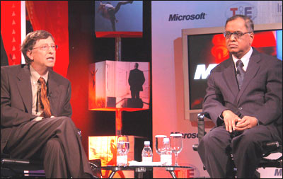 (Above) Microsoft founder Bill Gates and Infosys chairman Narayana Murthy during a chat show for a TV channel in New Delhi on Wednesday. UNI Photo
