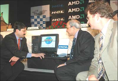 Information Technology Minister Dayanidhi Maran unveiling the new HCL-AMD affordable computer in New Delhi on Thursday. The PC is available at Rs 9,990. With a Microsoft XP Starter edition bundled along, the PC will cost Rs 11,240. Photograph; Sondeep Shankar/ Saab Pictures