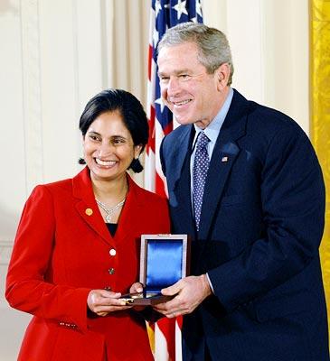 Padmasree Warrior, executive vice president and chief technology officer, Motorola, accepting the 2004 National Medal of Technology Award from President George W Bush on behalf of her company at a ceremony in the East Room of the White House on February 13. Photograph courtesy: Motorola