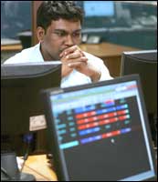 An Indian stockbroker keeps watch on his monitor as Indian stock market plunged by 826 points to 11,391 on 18 May, 2006. Photograph: Sebastian D'Souza/AFP/Getty Images