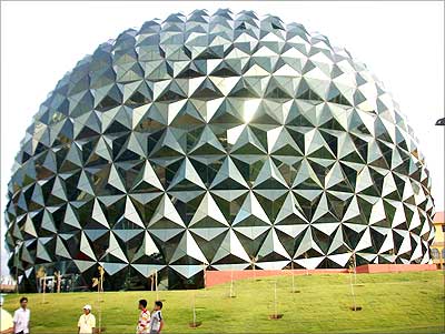 The multiplex at the Infosys Mysore Development Centre. Shaped like a massive golf ball, it is perhaps the most photographed structure on the sprawling Infosys campus. | Photograph: Rediff Archives
