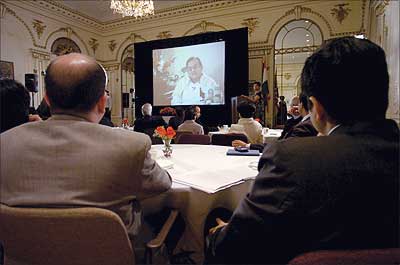 Finance Minister P Chidambaram explaining the Budget 2007-08 proposals to bankers, industrialists, analysts, financial market executives and mediapersons -- at the Indian Consulate in New York -- via a live video conference on Wednesday. The 45-minute video conference was the first ever organised by the Consulate with help from ICICI Bank. Photograph: Paresh Gandhi