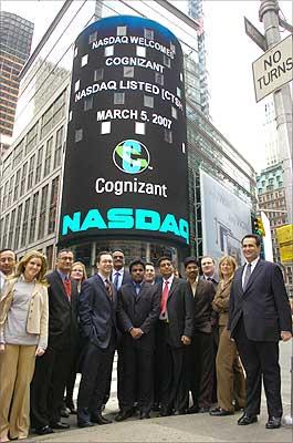 Cognizant Technology Solutions team, Nasdaq officials and traders after the Opening Bell ringing ceremony at the Nasdaq, Times Square, New York on Monday. Cognizant rang the bell from a remote location in Chennai to signal the beginning of trading on the Nasdaq. Photo: Paresh Gandhi