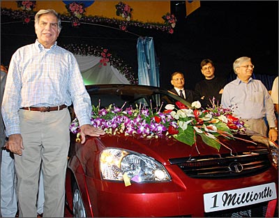 Tata Motors chairman Ratan Tata with the 1 millionth passenger car off the Indica platform from the company's facility at Pune on Saturday. Photograph, courtesy: Tata Motors