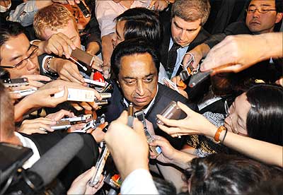 Commerce Minister Kamal Nath is surrounded by the press as he leaves the World Trade Organisation talks at the WTO headquarters in Geneva. | Photograph: Fabrice Coffrini/AFP/Getty Images