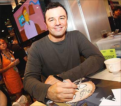 Creator Seth MacFarlane signs autographs during the American Dad panel at comic Con, 2008