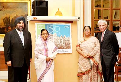 Jaspal Bindra, CEO-Asia, Stanchart; President Pratibha Patil; Meera Dutta, member, Postal Services Board and Peter Sands, group chief executive, Standard Chartered