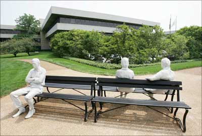 A sculpture called 'Three People on Four Benches' sits in front of Pepsico's world headquarters