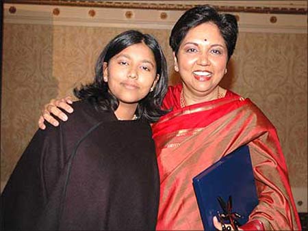 Indra Nooyi, CEO, PepsiCo, with her daughter.