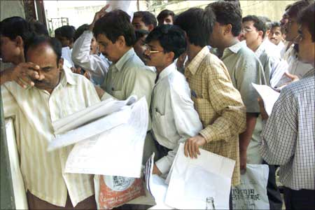 Tax payers queue up to file their income tax returns in Mumbai. Photograph: Reuters