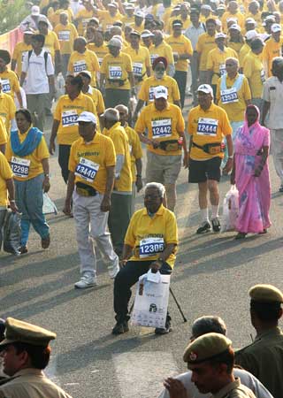 Elderly people participate in a senior citizens run in New Delhi. | Photograph: B Mathur/Reuters