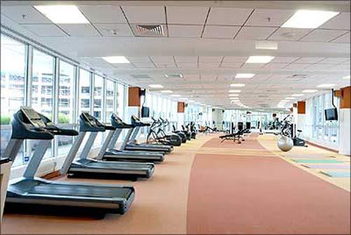 Image: Cisco Gym Hall Way: Cisco's state of the art gym and fitness centre has personal trainers and a wide range of exercise equipment. 