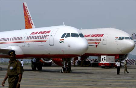 Air India's newly acquired Airbus A321 (L) and Boeing 777-200 LR aircraft. | Photograph: Punit Paranjpe/Reuters