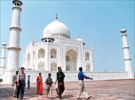 An unusually few number of tourists are seen visiting India's the popular Taj Mahal monument in Agra. | Photograph: Stringer/Reuters
