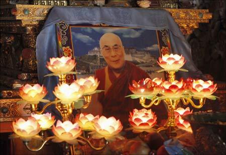 A picture of the Dalai Lama is seen at a monastery near Tongren, Qinghai province, China. | Photograph: Reinhard Krause/Reuters