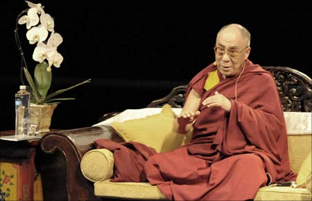 Exiled Tibetan spiritual leader the Dalai Lama delivers a lecture on 'The Nature of Mind' in California. | Photograph: Phil Klein/Reuters