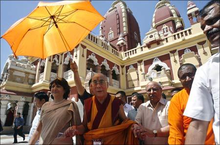 Tibetan spiritual leader, the Dalai Lama, leaves after visiting the Birla Mandir (temple) in New Delhi. | Photograph: Adnan Abidi/Reuters