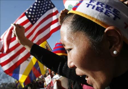 A demonstrator yells during a rally across from the White House on the eve of the 50th anniversary of the Tibetan Uprising in Washington, March 9, 2009. | Photograph: Jim Young/Reuters