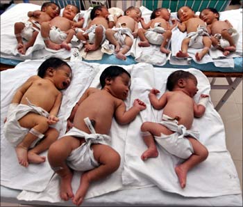 Newly born babies rest inside a ward at a hospital in Lucknow.