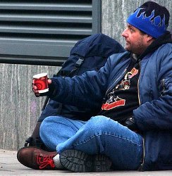 A man begging in a London street