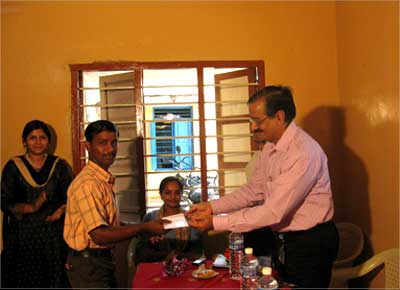An eJeevika-trained youth receiving a job offer letter