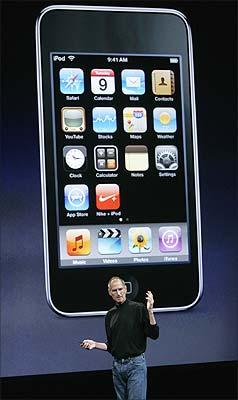 Apple Inc CEO Steve Jobs shows off a thinner iPod Touch.