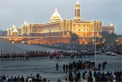 People watch the 'Beating the Retreat' ceremony during the Indian Republic Day celebrations in front of the South and North Block in New Delhi. The North Block houses India's Union Finance Ministry. | Photograph: B Mathur/Reuters