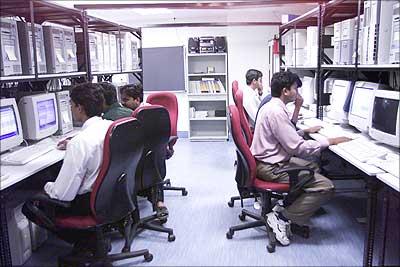 Software engineers work in the datacentre of Microsoft India (R&D) Pvt Ltd in Hyderabad