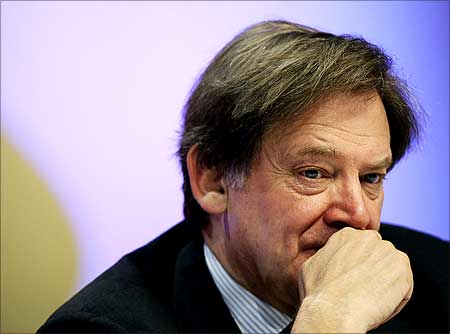 CEO of Schlumberger, <b>Andrew Gould</b> attends a plenary session during the <b>...</b> - 15andrew