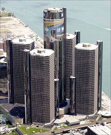 The General Motors building is seen beside the Detroit River in Detroit, Michigan