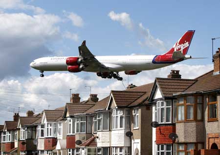 A Virgin Atlantic aircraft comes in to land at London's Heathrow Airport.